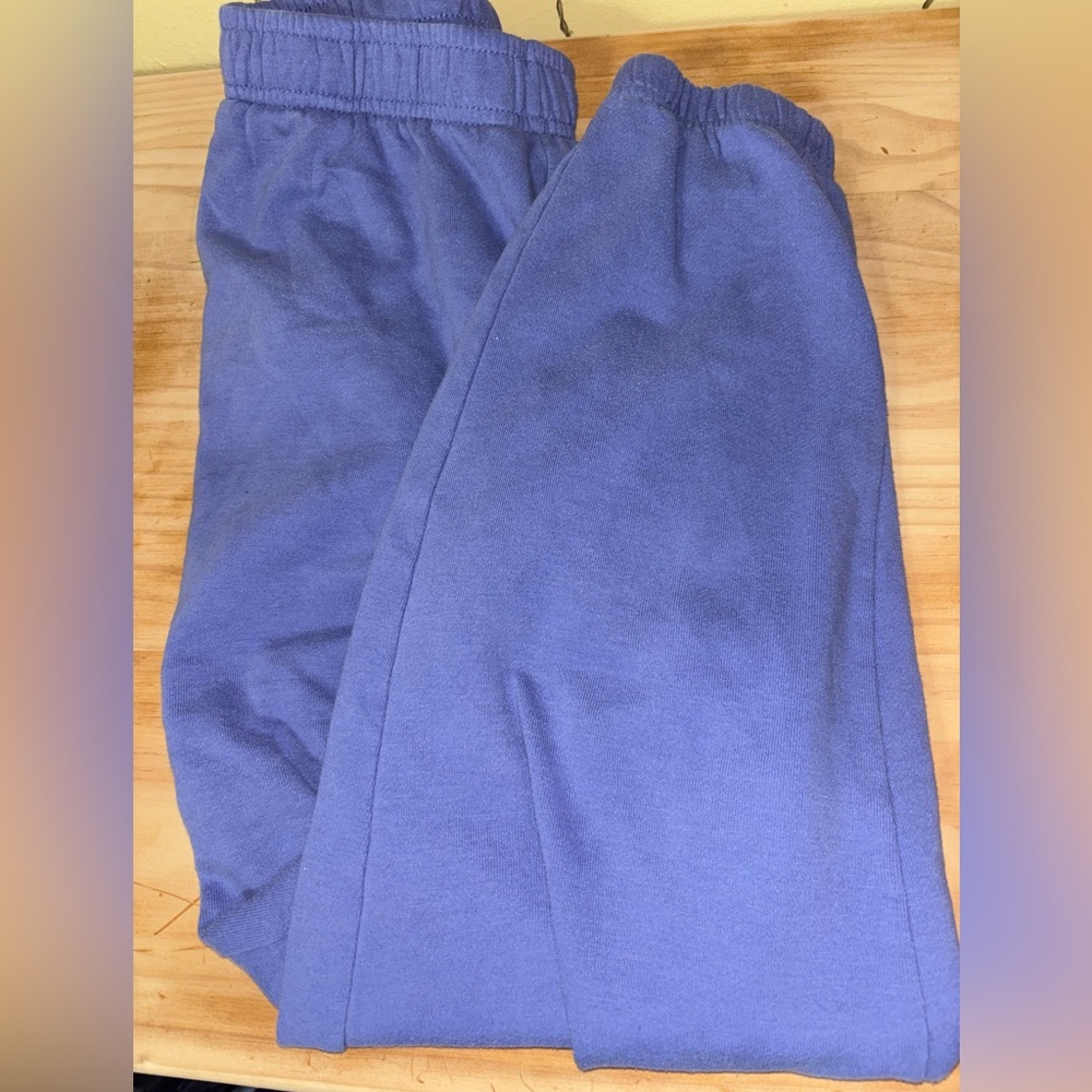 Woman’s purple/blue joggers